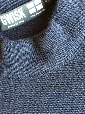 Détail étiquette tissée sur pull 100% laine fabriqué en France.