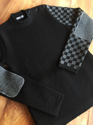 Pull "Chill" Noir à damier. Confortable et durable en laine mérinos.